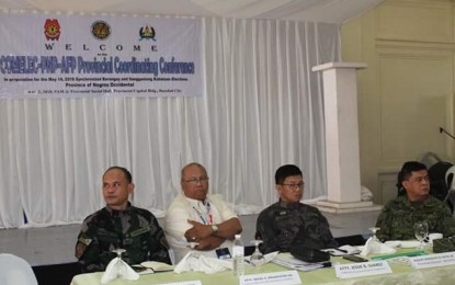<p><strong>POLL CONFERENCE.</strong> Negros Occidental Provincial Elections Supervisor Jessie Suarez (2<sup>nd</sup> from left) with Superintendent Victorino Romanillos, Bacolod police deputy director for administration; Senior Superintendent Rodolfo Castil Jr., Negros Occidental police director; and Col. Eliezer Losañes, commander of the Army’s 303rd Infantry Brigade, during the Provincial Coordinating Conference in Bacolod City on Wednesday (May 2, 2018) (<em>Photo courtesy of Bacolod City Police Office)</em></p>